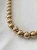 Collier perles doré