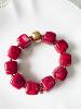 Bracelet perles bordeaux doré