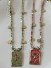 collier médaillon coquillage vert doré