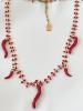 collier piment doré