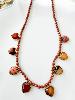 Collier pierres coeurs marron doré