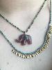 Collier éléphant pierres bordeaux doré