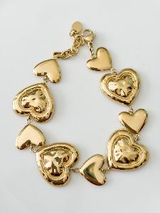 Bracelet coeurs gravés doré