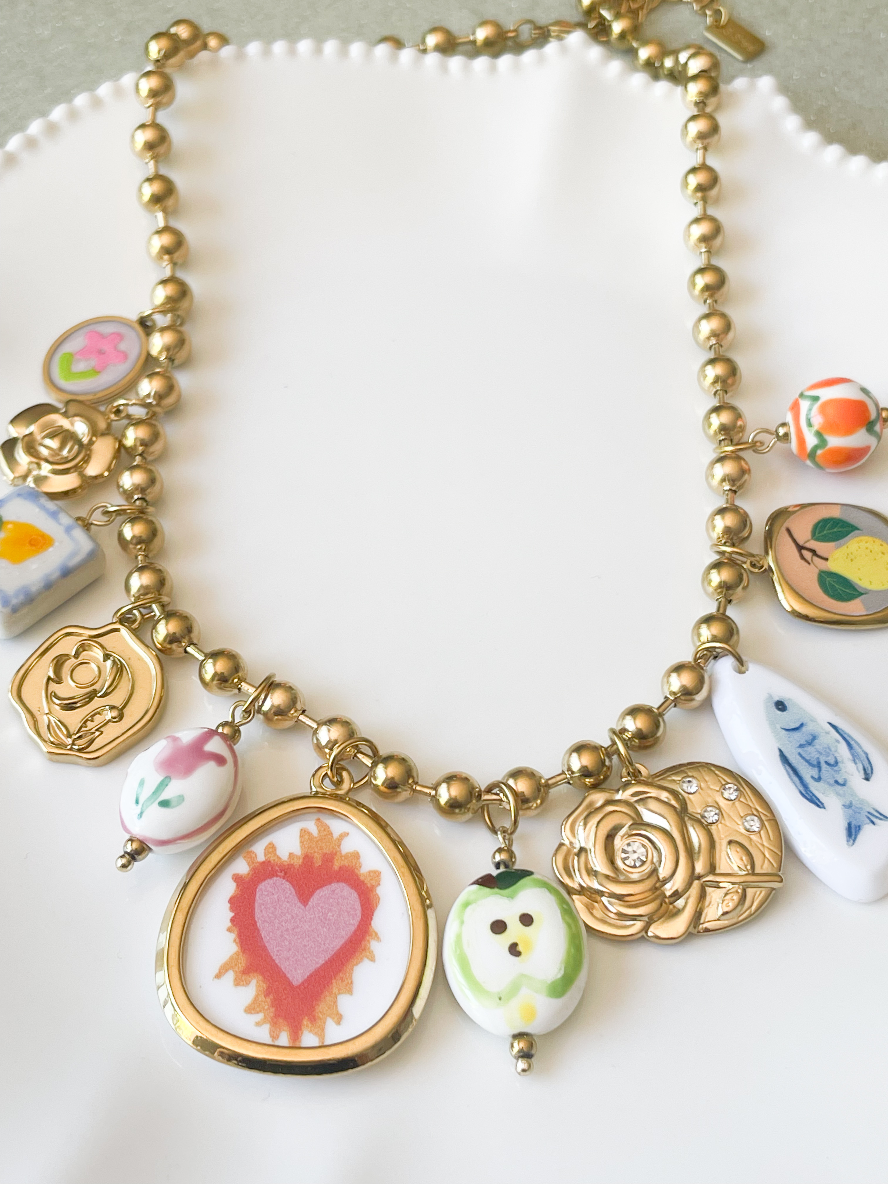 Collier breloques coeur ex voto doré