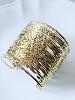 Bracelet manchette large doré