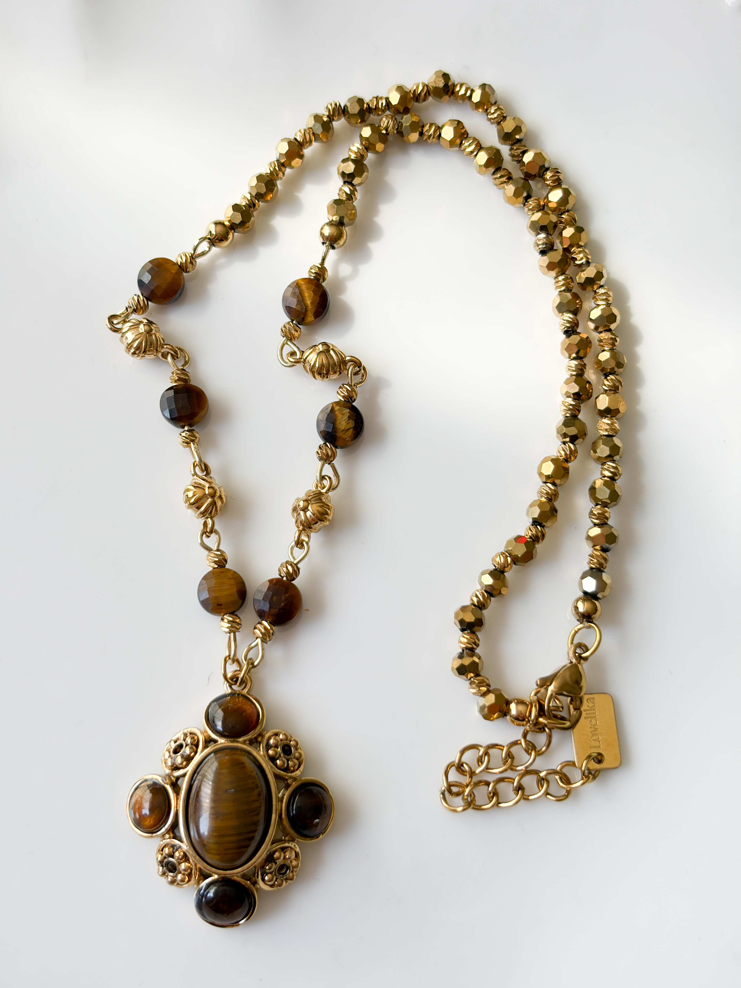 Collier pierre marron doré