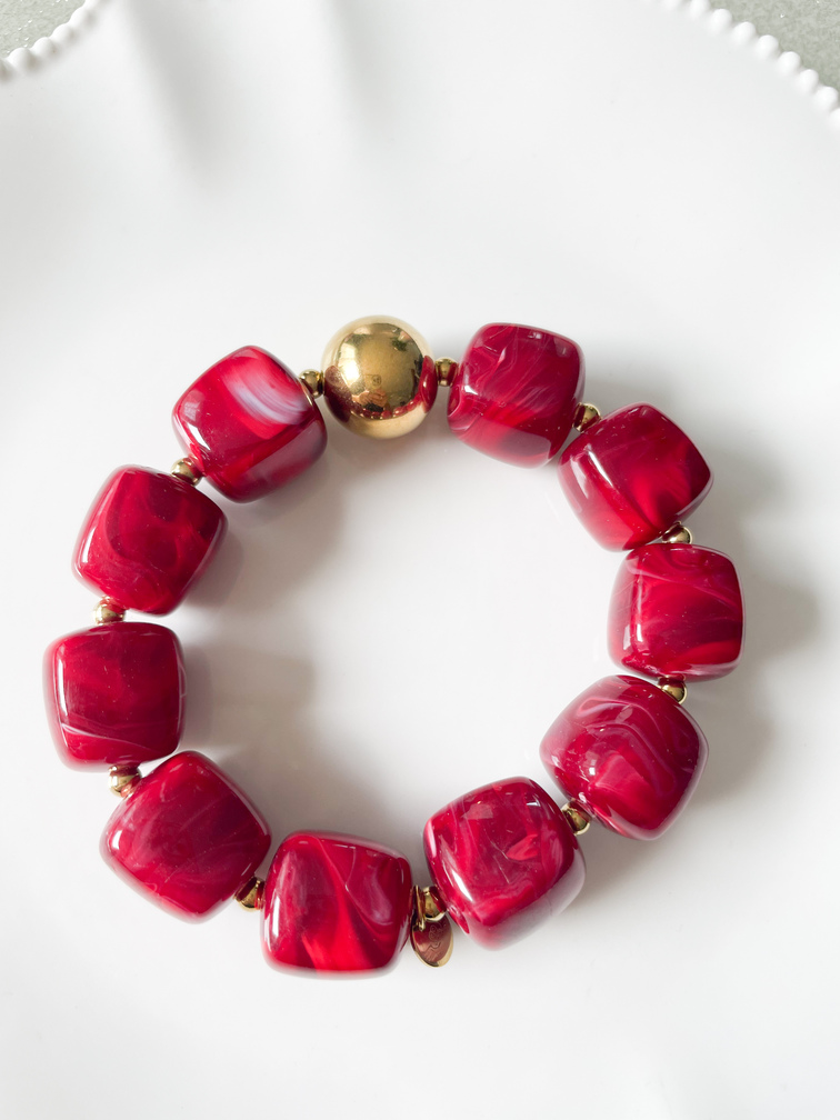 Bracelet perles bordeaux doré