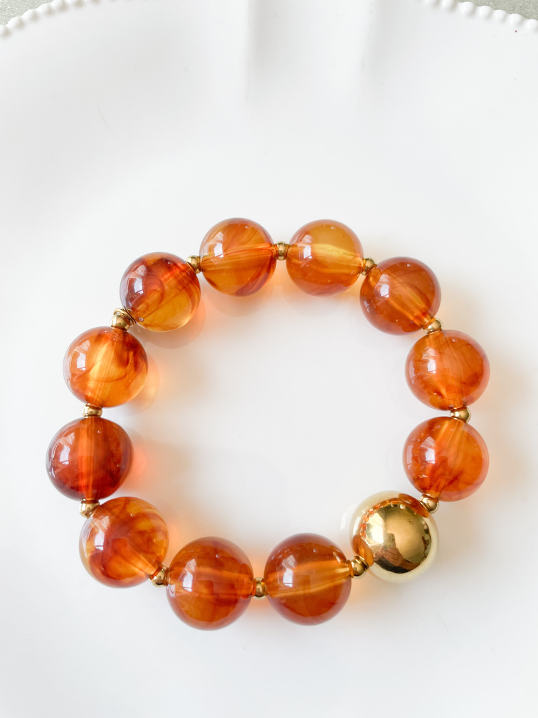 Bracelet perles rondes ambre doré