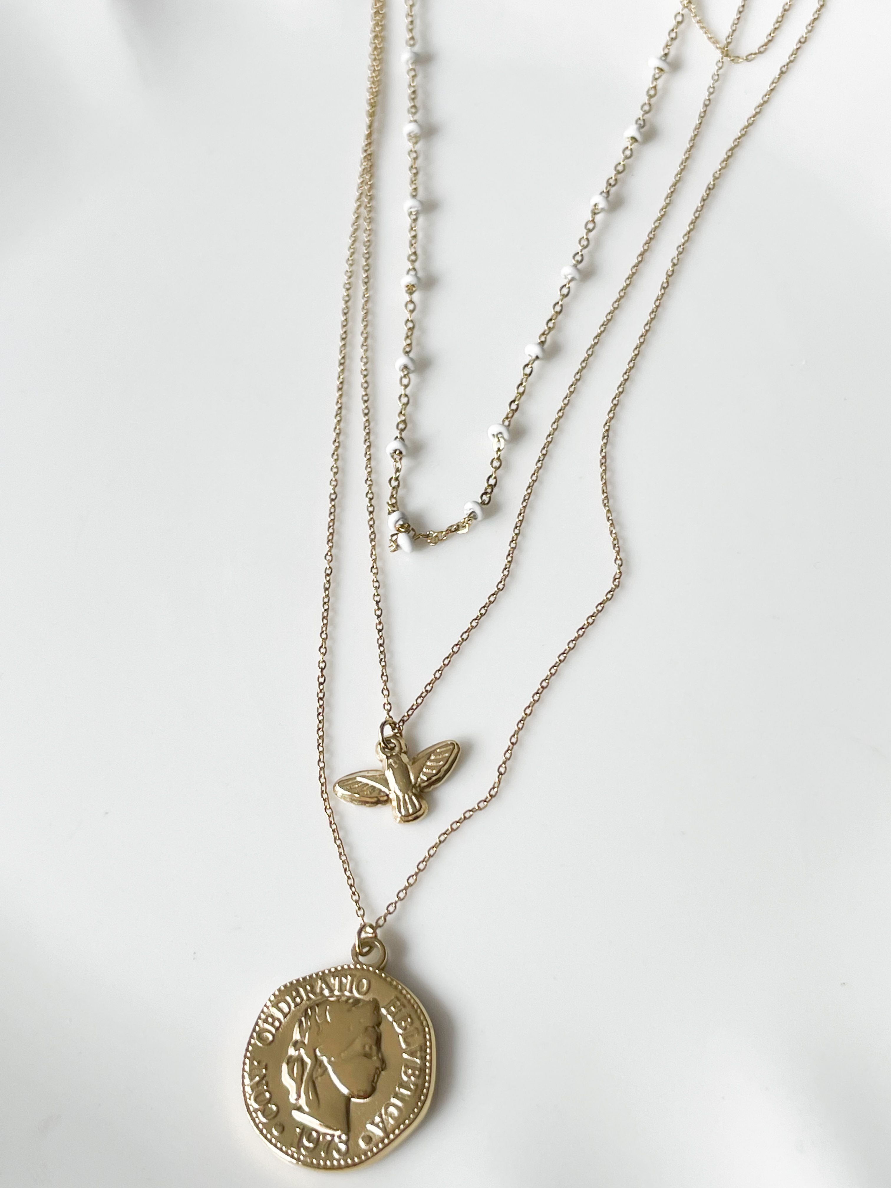 Collier 3 rangs oiseau doré