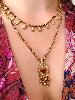 Collier médaillon coeur marron doré 