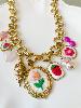 Collier breloques fleurs brodées n2 doré