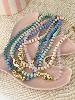 Collier Calypso poisson lavande doré