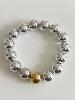 Bracelet perles rondes argenté doré