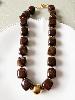 Collier perles marron doré