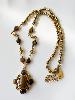 Collier pierre marron doré