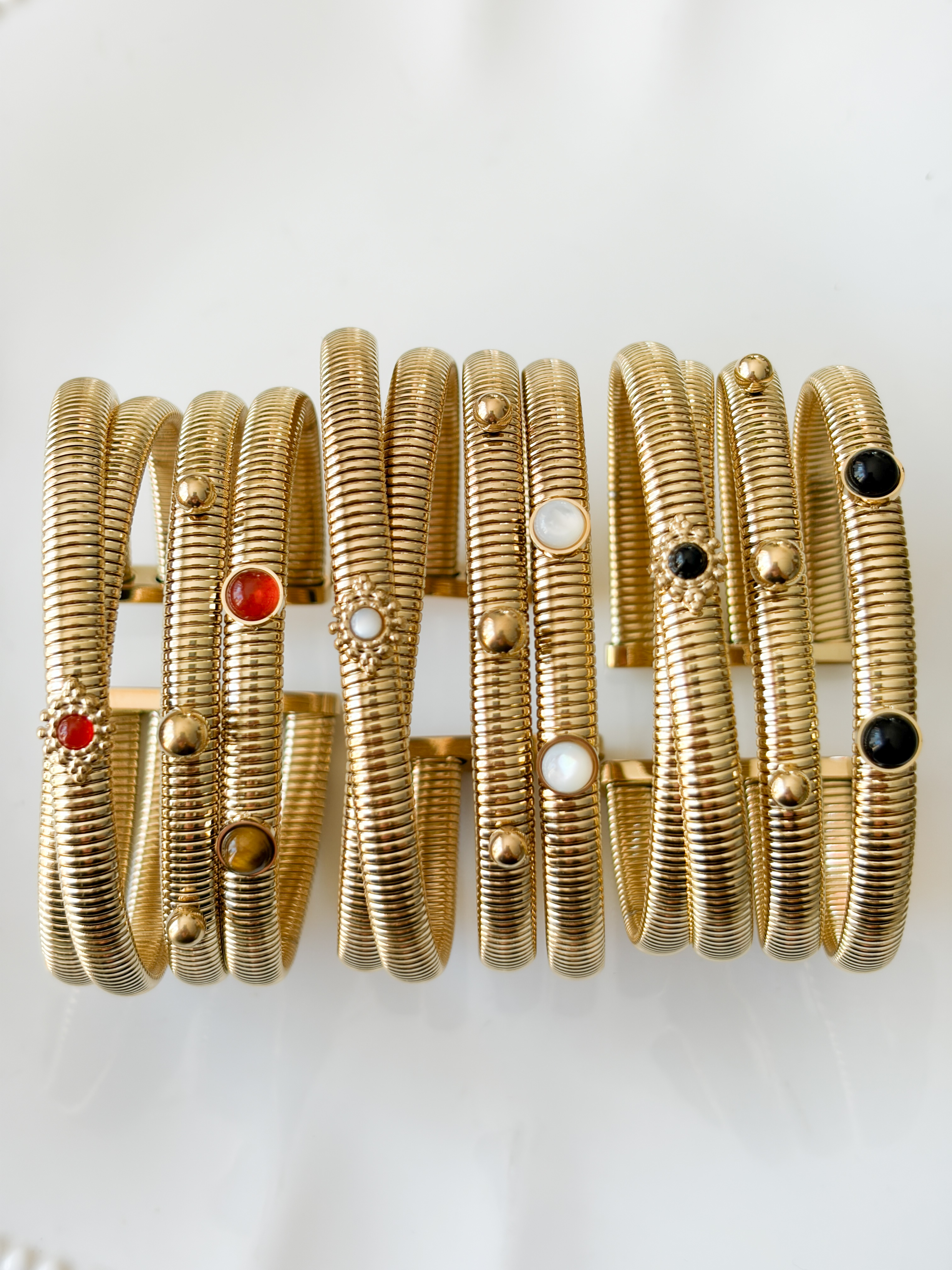 bracelet manchette Neptune 4 rangs noir doré