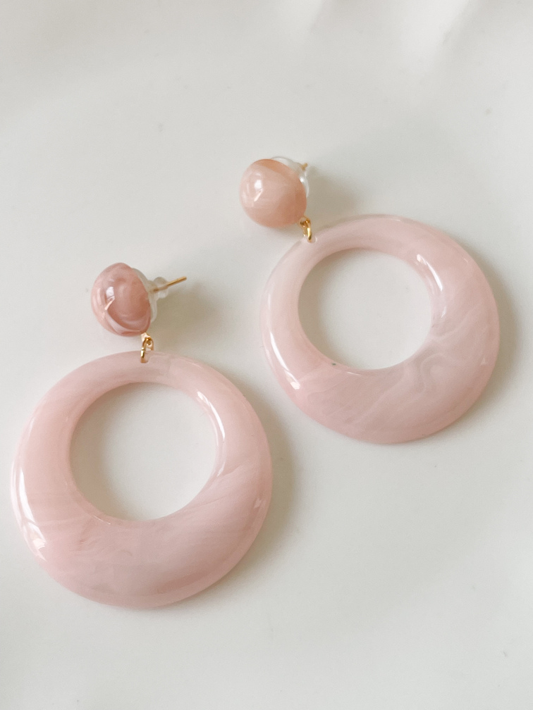 Boucles résine rose de la capsule Cricri