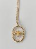Collier oiseau doré