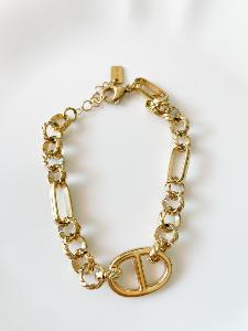 Bracelet maillons torsadé doré 