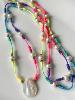 collier sautoir fluo nacre