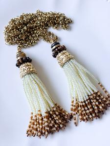 Collier sautoir perles beige doré