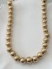 Collier perles doré