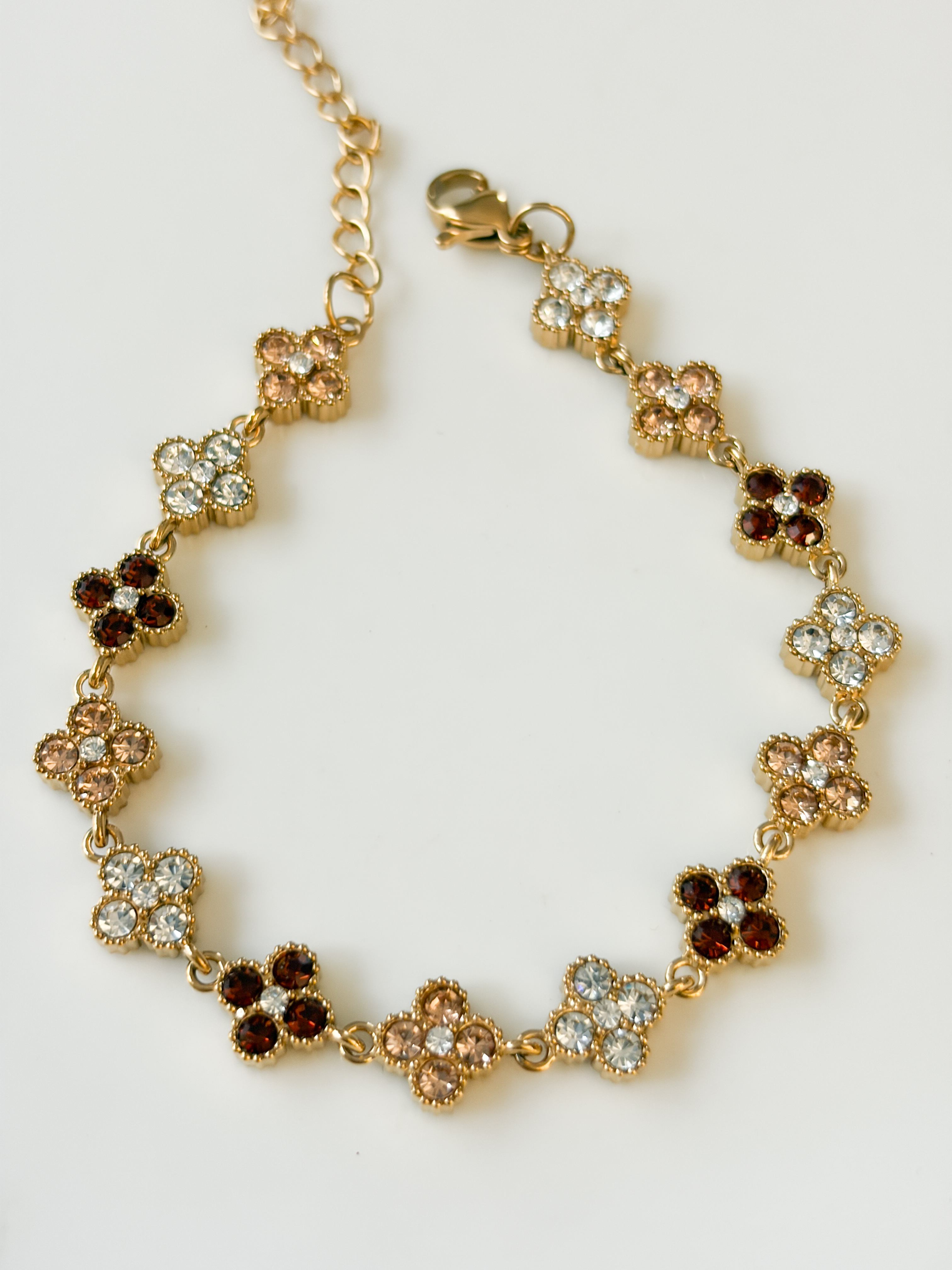 Bracelet petites fleurs strass marron doré