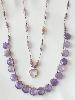 Collier pierres coeur mauve doré 