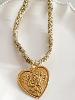 Collier tresse médaille coeur doré