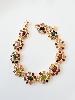 Bracelet pierres fleurs doré