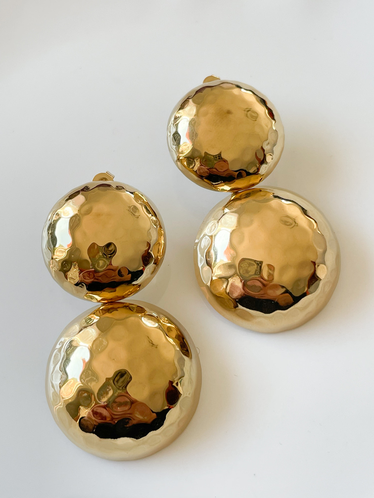 Boucles rondes doré de la capsule Cricri