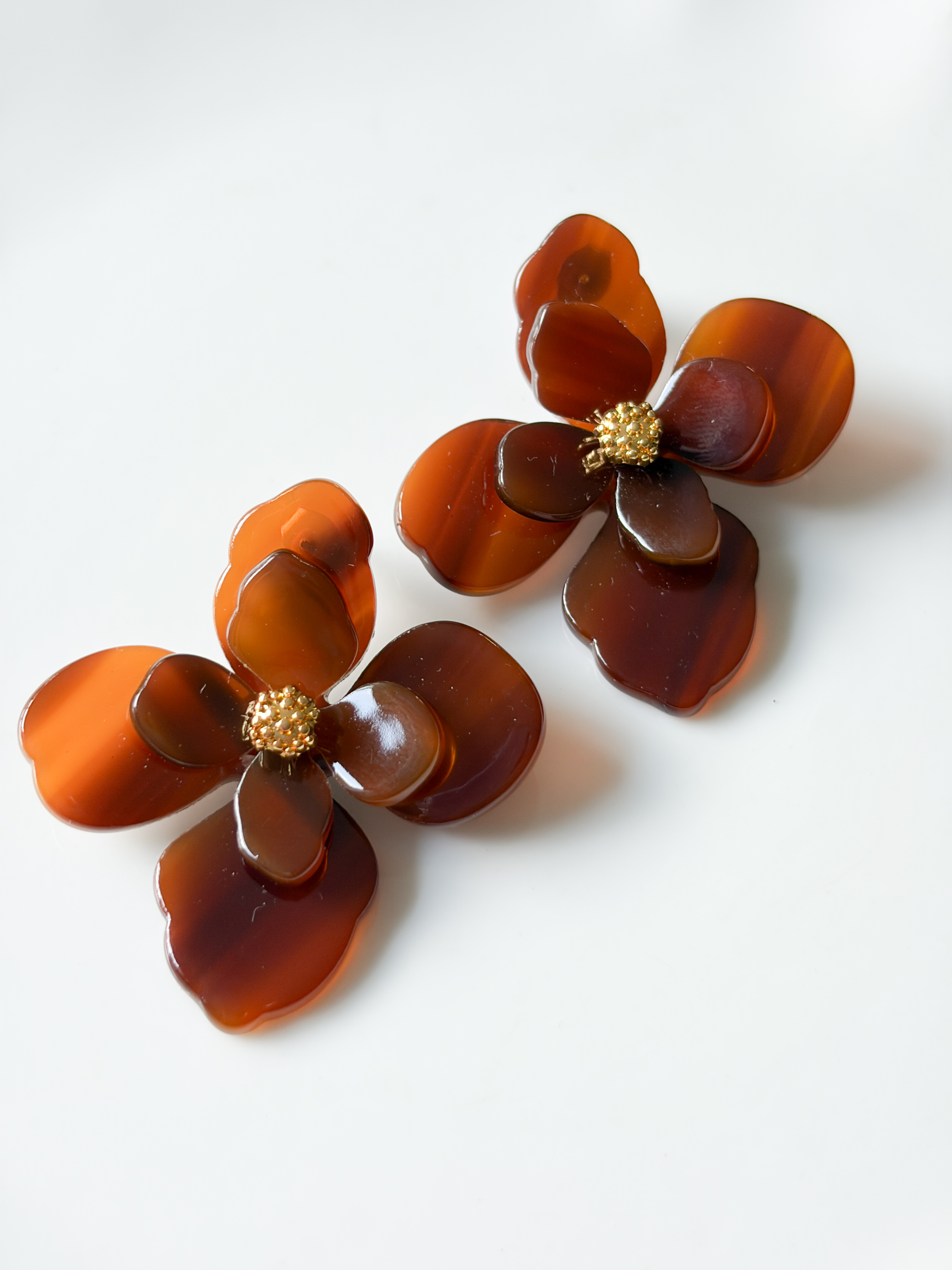 Boucles fleurs marron doré de la capsule de Cricri