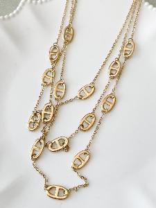 Collier maillons triple rangs doré 