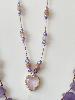 Collier pierres coeur mauve doré 