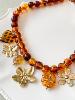 collier Paloma ambre fleurs doré
