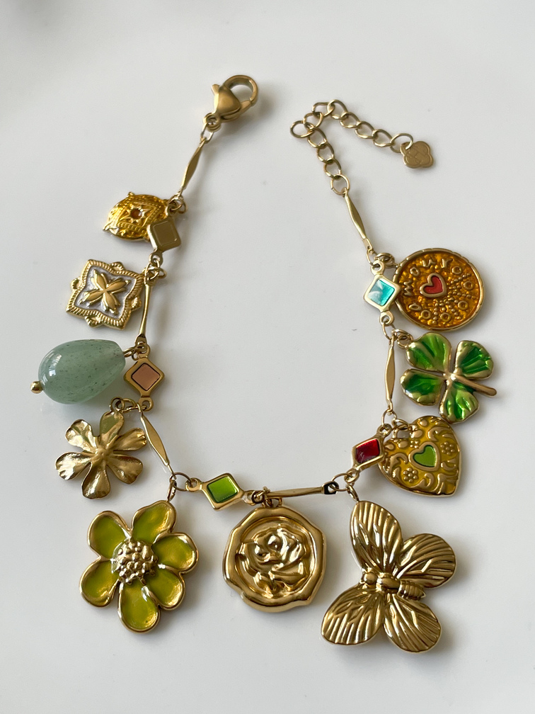 Bracelet breloques fleurs vert doré