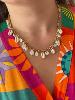 collier coquillage blanc doré