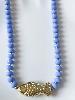 Collier Calypso poisson lavande doré