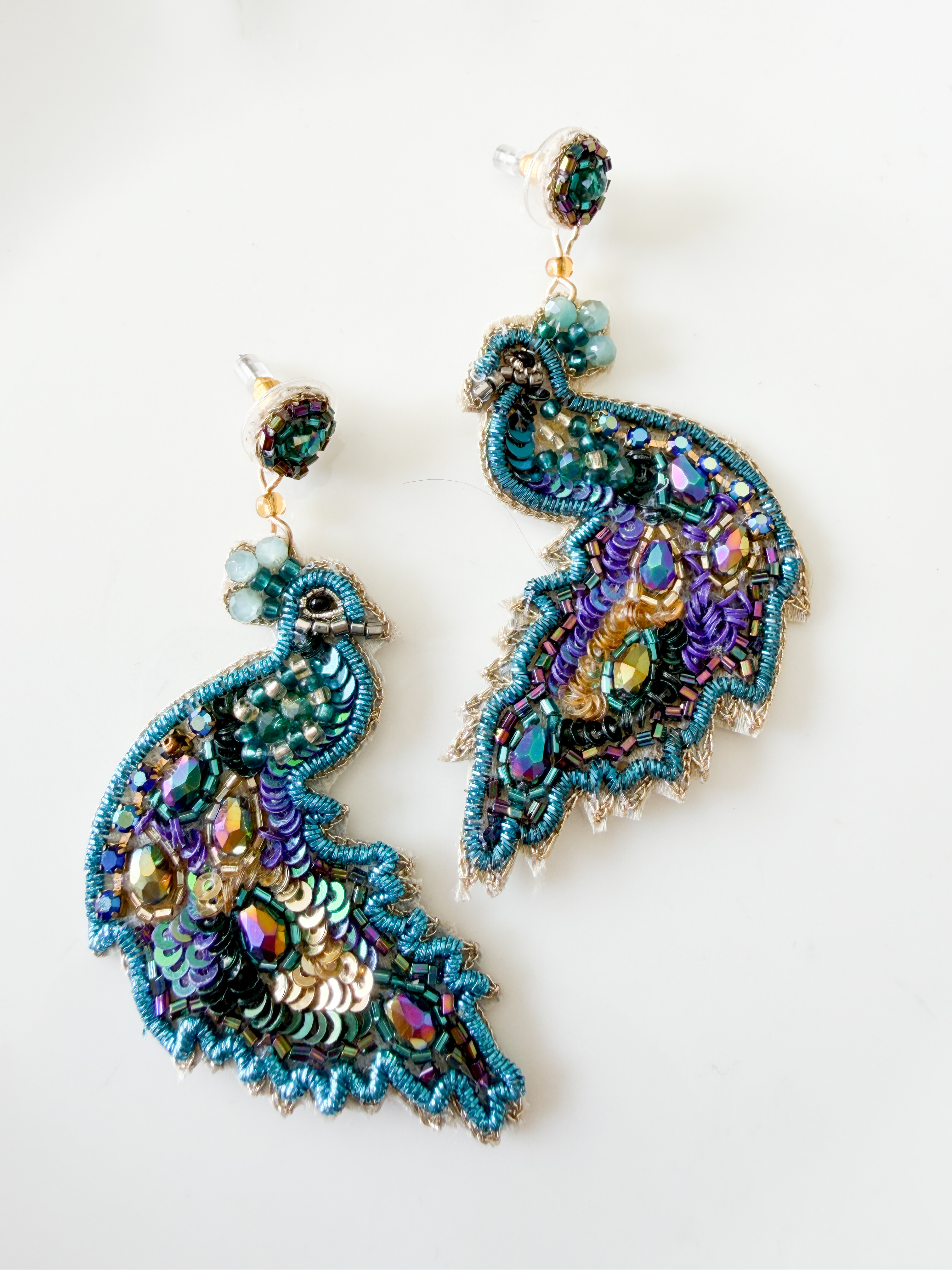 Boucles paon perles brodées