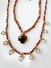 Collier pierres coeurs marron strass doré