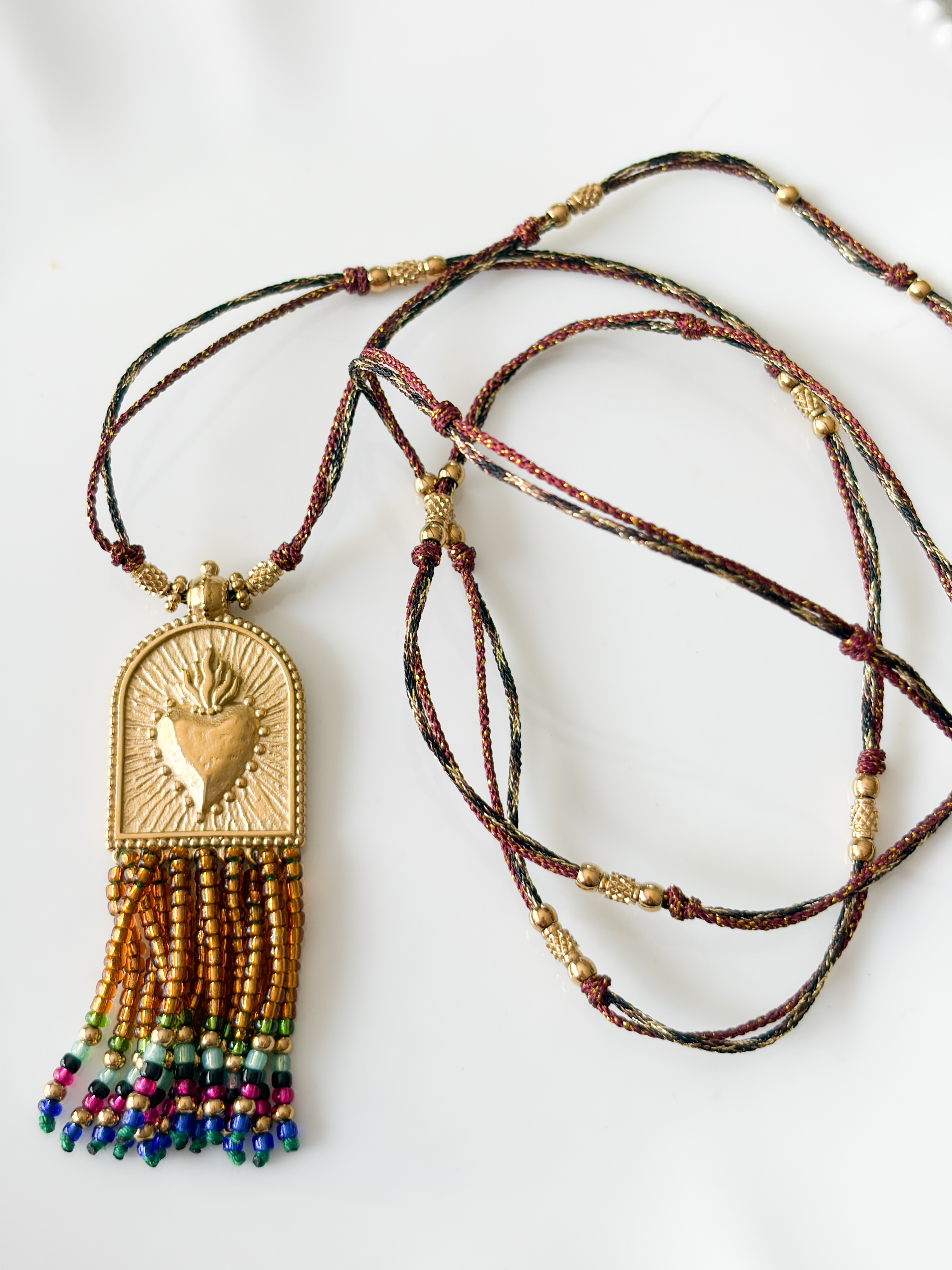 Collier sautoir médaillon coeur doré