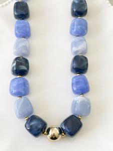 Collier perles bleues doré du Live