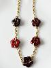 Collier fleurs prune bordeaux doré