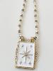 collier médaillon blanc étoile doré