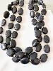 Collier noir multi doré