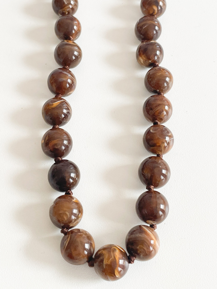 Collier perles marron doré