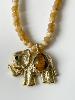 Collier éléphant pierres ocre doré