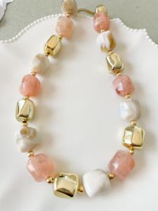 Collier rose doré de la capsule Cricri