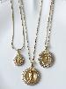 Collier Madone strass blancs ovale doré