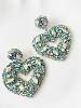 Boucles coeur bleu de Mandalita